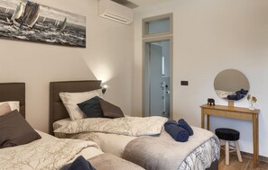 3 slaapkamers, een strijkplank/strijkijzer, reisbedje, gratis wifi