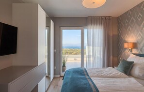 4 habitaciones, tabla de planchar con plancha y cuna de viaje 