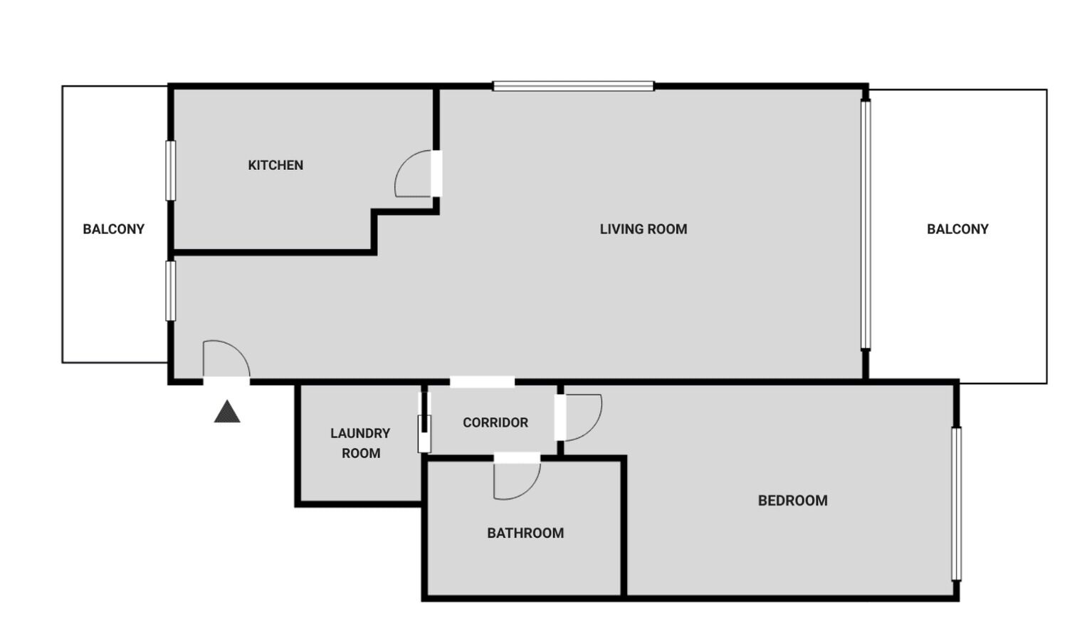 Ein Grundriss mit Küche, Wohnzimmer, Balkon, Waschraum, Badezimmer, Schlafzimmer und einem Flur.