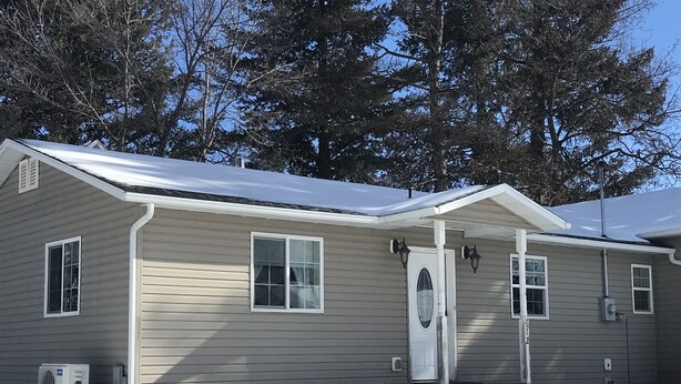 A single-story house with a gabled roof, a front door, and two windows. - Craigmont Getaway
Get comfortable and enjoy plenty of space and cozy fireplace! (Craigmont)