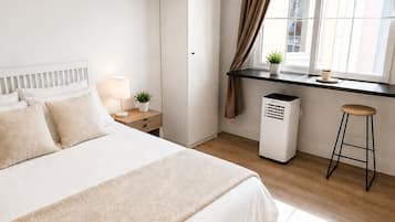 1 dormitorio, tabla de planchar con plancha, cuna de viaje y wifi