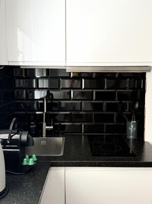 Microwave, coffee/tea maker, toaster, cookware/dishes/utensils