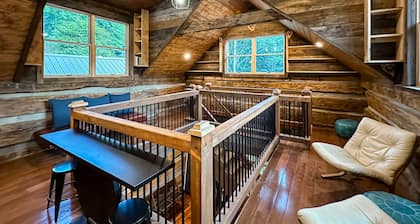 Secluded luxury cabins with water views, game table, wood stove & outdoor dining