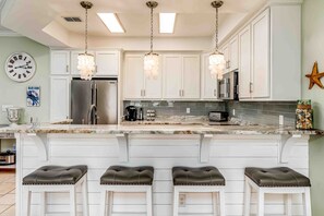 Fridge, microwave, oven, stovetop - Ground-floor condo next to on-site pool with private patio & beach access (Dauphin Island)