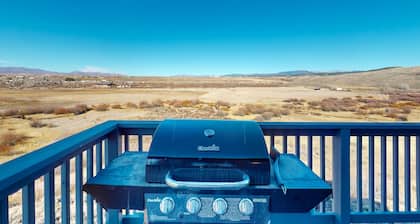 Mountain getaway with hot tub, game room, fireplace, and modern interior