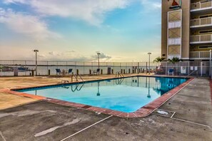 Pool - Canal view condo with pool & grill access - scenic balcony, open layout, and AC (Ocean City)