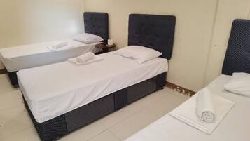 Triple Room | Free WiFi, bed sheets