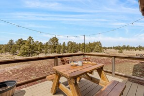 Enjoy a romantic meal for two on the deck, surrounded by nature's beauty.