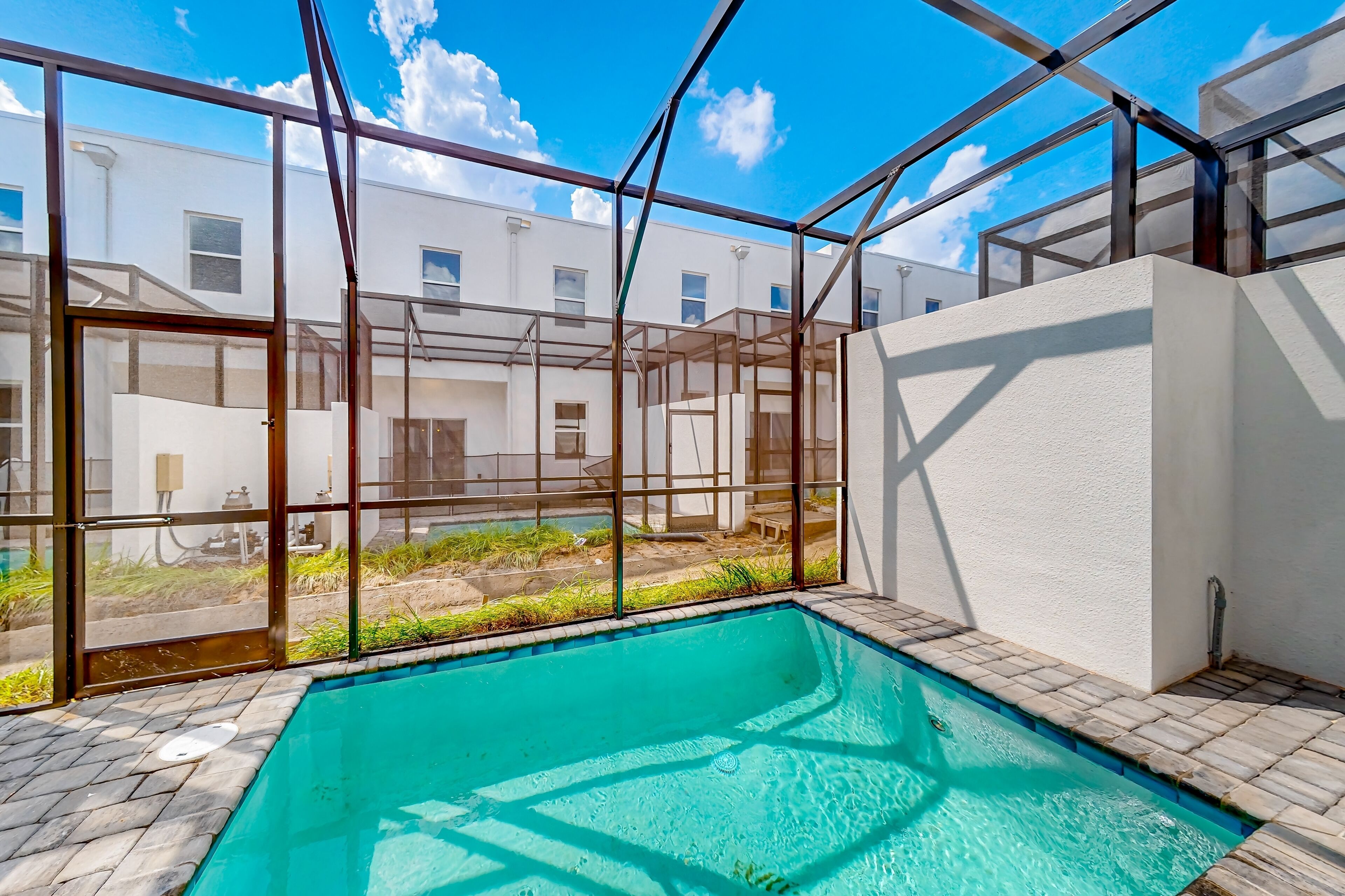 Elegant dog-friendly townhouse with a lanai, private pool, & washer/dryer