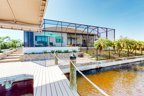 Terrace/patio - Amazing dog-friendly riverfront oasis w/ private pool, patio, dock & EV charger (Cape Coral)