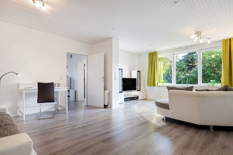 TV, stereo. Holiday Apartment 'Am Fährhafen' with Private Garden and Wi-Fi