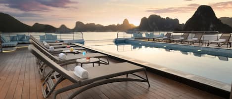 Outdoor pool, pool umbrellas, pool loungers