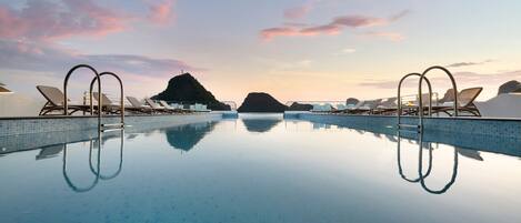 Outdoor pool, pool umbrellas, pool loungers