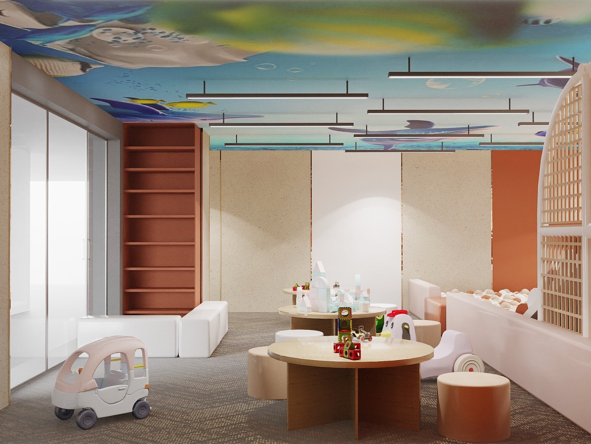 A children's playroom with a slide, a small car, and a table with toys.