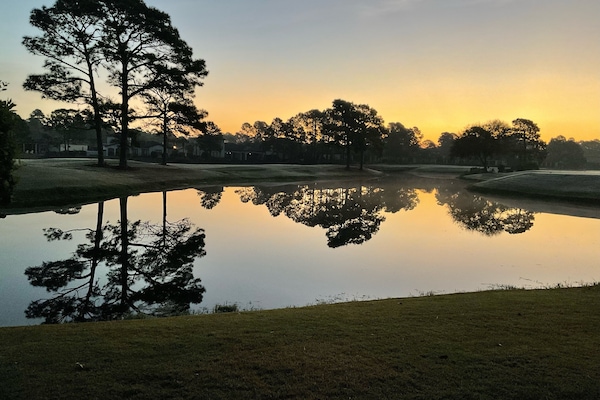 Sunrise from the back patio overlooking the golf course.