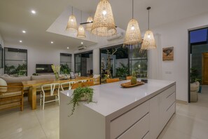 Luxury Villa | Living area | Books - Puri Senang - Modern 4BR Pool Villa · Central Berawa · 6 min to Beach & Finns (Canggu)