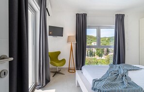 2 slaapkamers, een strijkplank/strijkijzer, gratis wifi, beddengoed