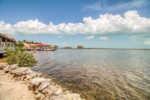 Beach - Waterfront resort villa with water views, balcony, full kitchen, & washer/dryer (San Pedro)