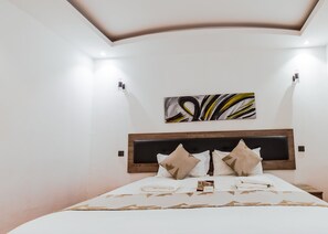 1 habitación, tabla de planchar con plancha, wifi y ropa de cama 