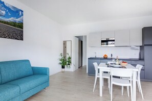 Apartment, 1 Bedroom, Patio, Ground Floor | Living area | 40-inch LCD TV with digital channels - Appartamenti le Vele - Siroli Collection (Cervia)