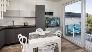 Panoramic Apartment, 2 Bedrooms, Terrace, City View | Private kitchen | High chair