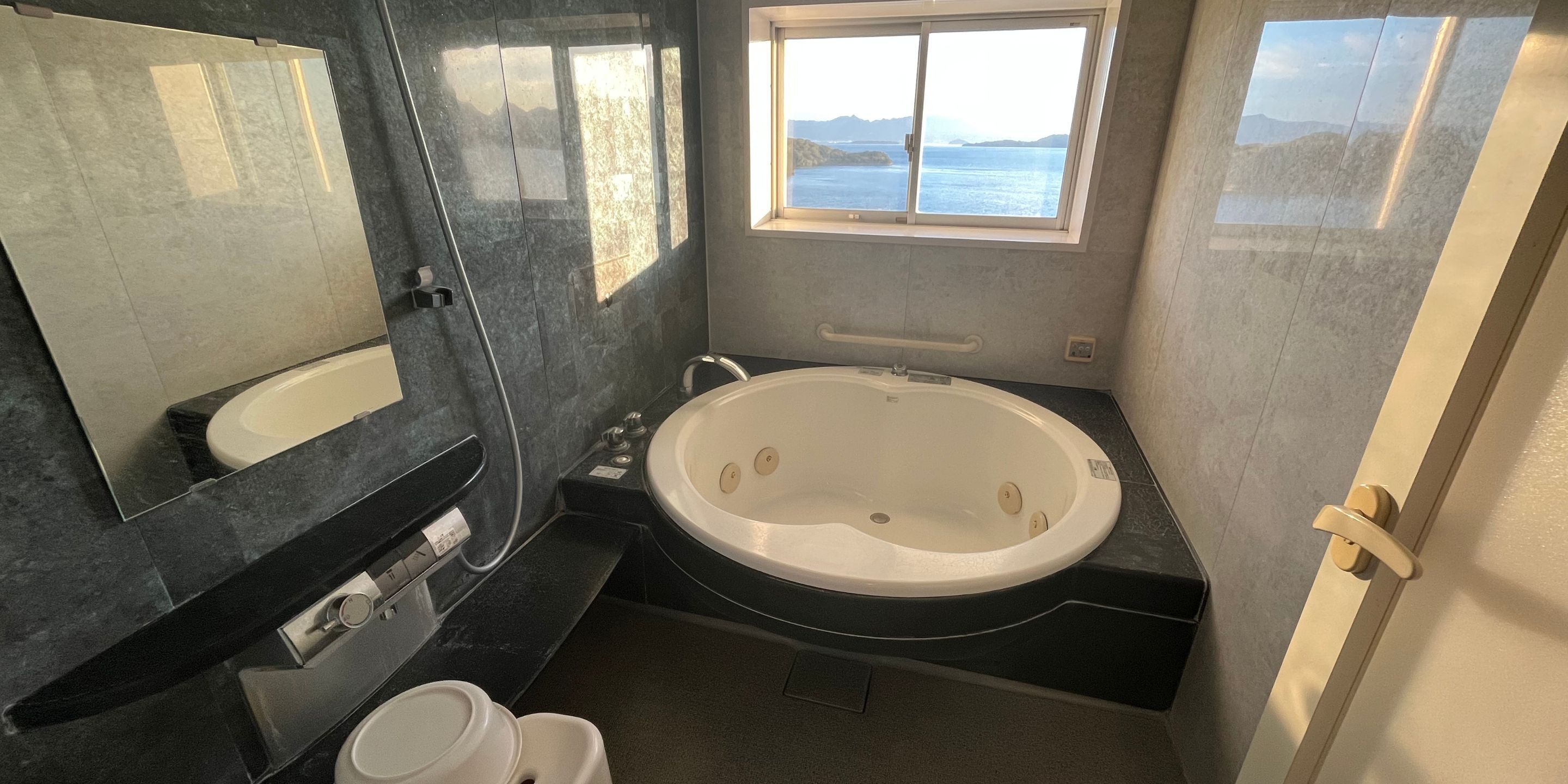 Signature Suite | Bathroom | Separate bathtub and shower, rainfall showerhead, free toiletries