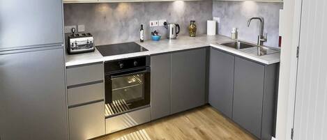 Fridge, microwave, oven, highchair