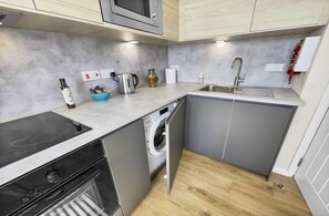 Fridge, microwave, oven, high chair