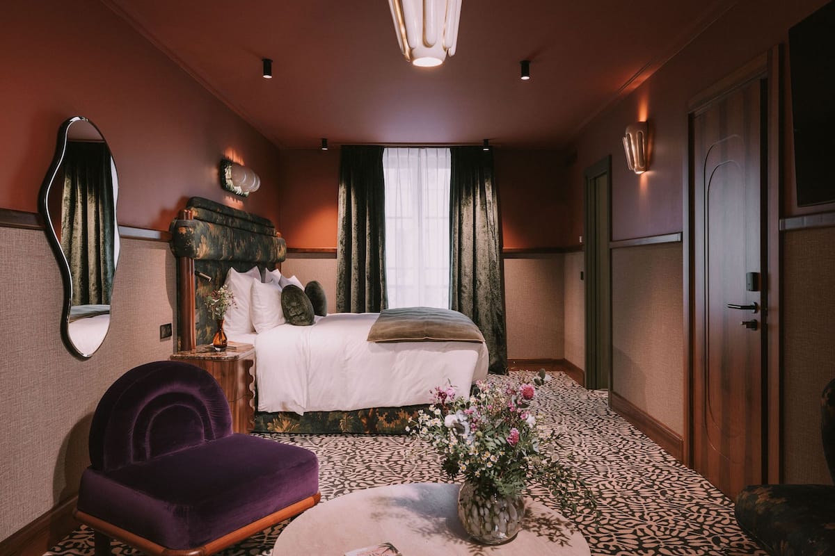 Suite Deluxe, bagno in camera | 1 camera, materassi a doppio strato, una cassaforte in camera
