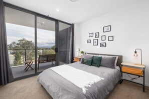 2 bedrooms, desk, iron/ironing board, travel crib