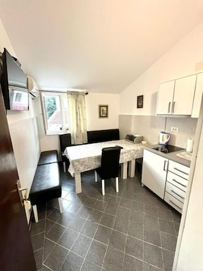Four Bedroom Superior Apartment, Sea View | Dining room - Apartments Harmonija  (Becici)