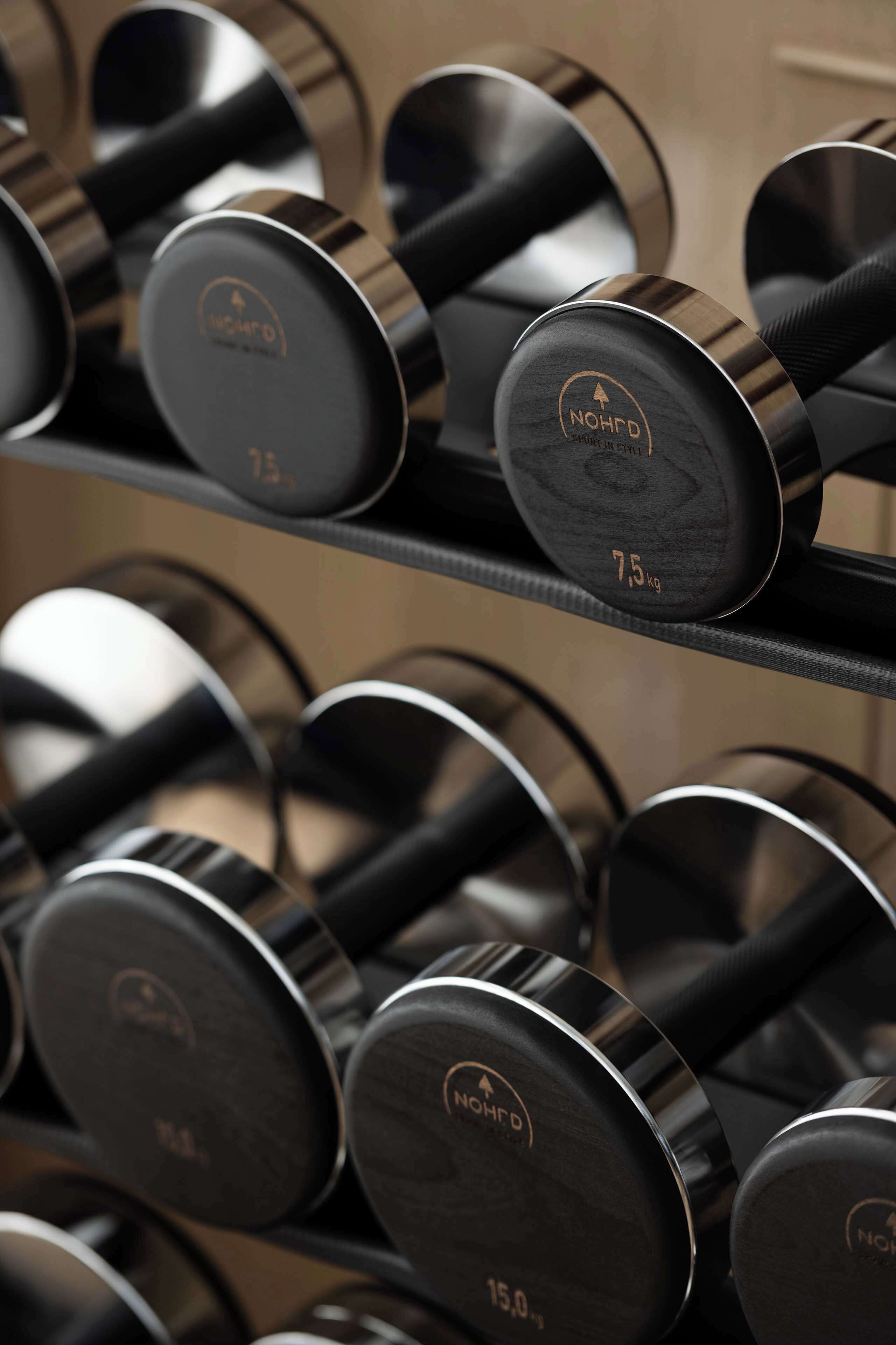 A rack of dumbbells with weight markings.