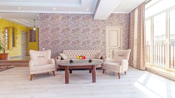 Premium Apartment | Living area | 1-inch TV with cable channels