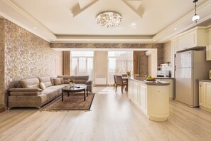 Luxury Apartment | Living area | 1-inch TV with cable channels - Stay Inn on Buzand 13 (Yerevan)