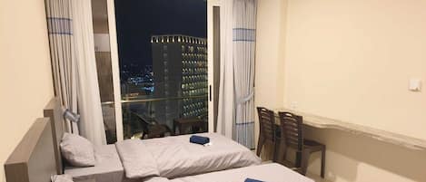 Departamento Deluxe, 2 camas individuales, vista a la ciudad | 1 habitación y wifi gratis