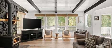 Smart TV, fireplace, foosball, books