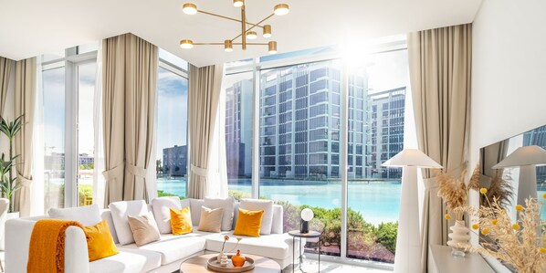 Living area - LUX The District One Lagoon View Suite (Dubai)