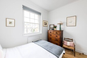 1 bedroom, laptop workspace, bed sheets