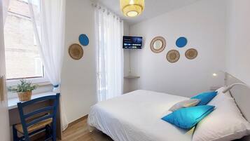 Chambre Confort, 1 grand lit