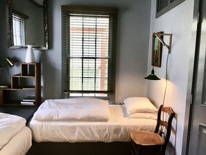 2 habitaciones, tabla de planchar con plancha y wifi gratis