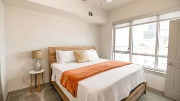 Apartment, 2 Bedrooms | 2 bedrooms, desk, laptop workspace, iron/ironing board