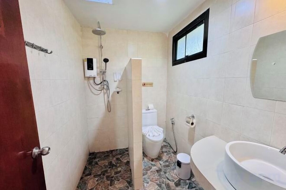 Bathroom | Shower, free toiletries, hair dryer, slippers