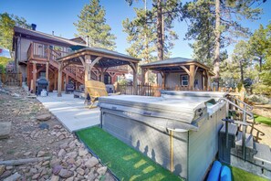 A wooden cabin with a hot tub, a deck, and a covered area. - 1 Mi to Lake: Home w/ Hot Tub & Gazebo in Big Bear (Big Bear Lake)