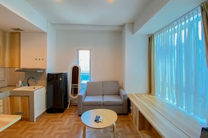 Apartment | Living area - Great Location And Comfy 1Br Apartment At Capitol Park Residence (Jakarta)