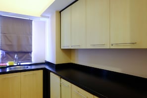 Apartment | Private kitchen | Full-size fridge, stovetop