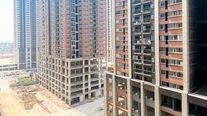 A high-rise residential building with multiple floors, large windows, and balconies. - Homey And Modern 2Br At 6Th Floor Meikarta Apartment (Cikarang)