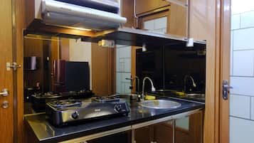 Apartment | Private kitchen | Full-size fridge, stovetop