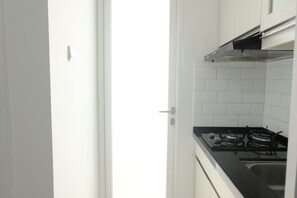 Apartment | Private kitchen - Stylish Modern 2Br Apartment At Parahyangan Residence (Bandung)