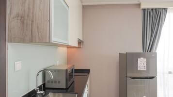 Apartment | Private kitchen | Full-size fridge, stovetop