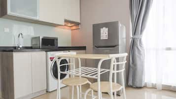 Apartment | Private kitchen | Full-size fridge, stovetop